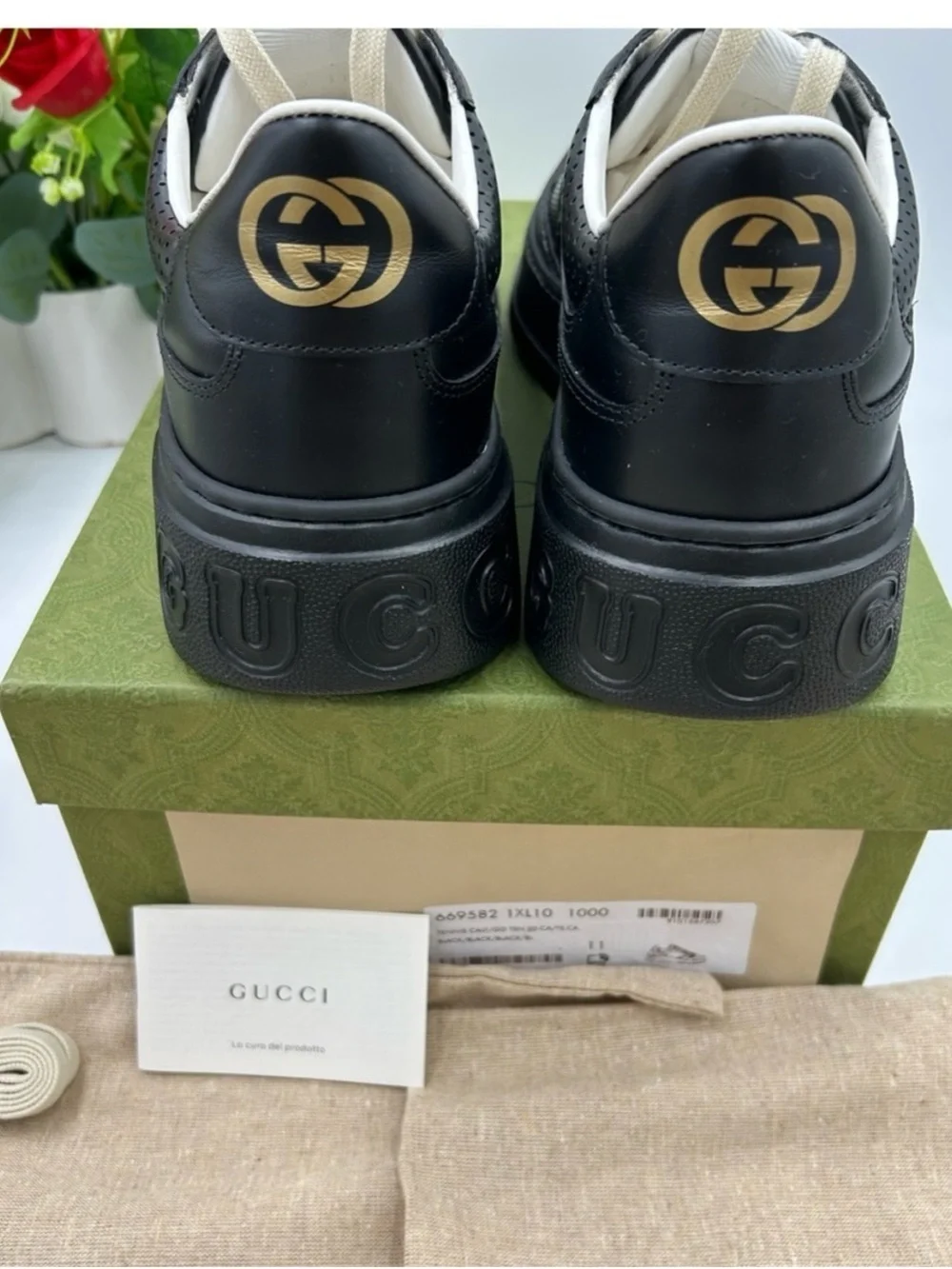 Gucci, GG embossed, black leather sneakers size 11 fits 11.5 made in Italy